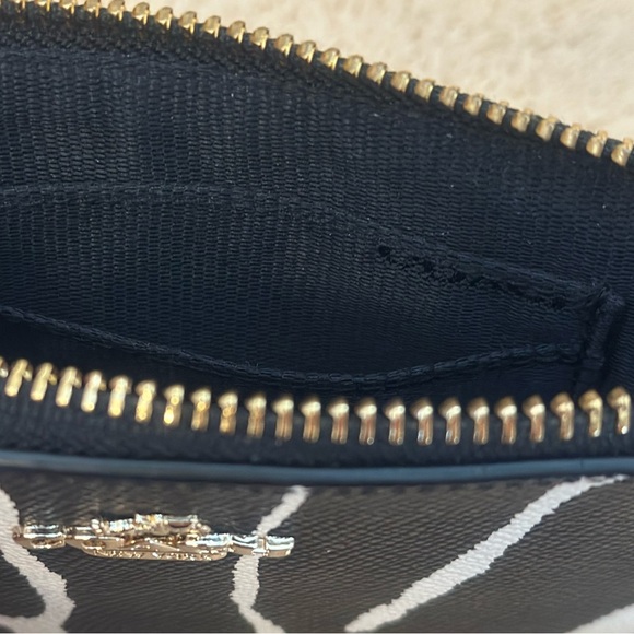 Coach Zebra Black and White Crossgrain Leather Corner Zip Wristlet - Picture 9 of 10